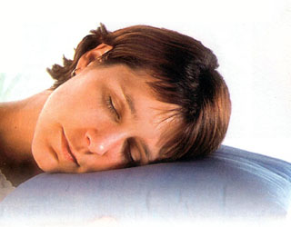 Woman Sleeping with her Night and Day Contacts